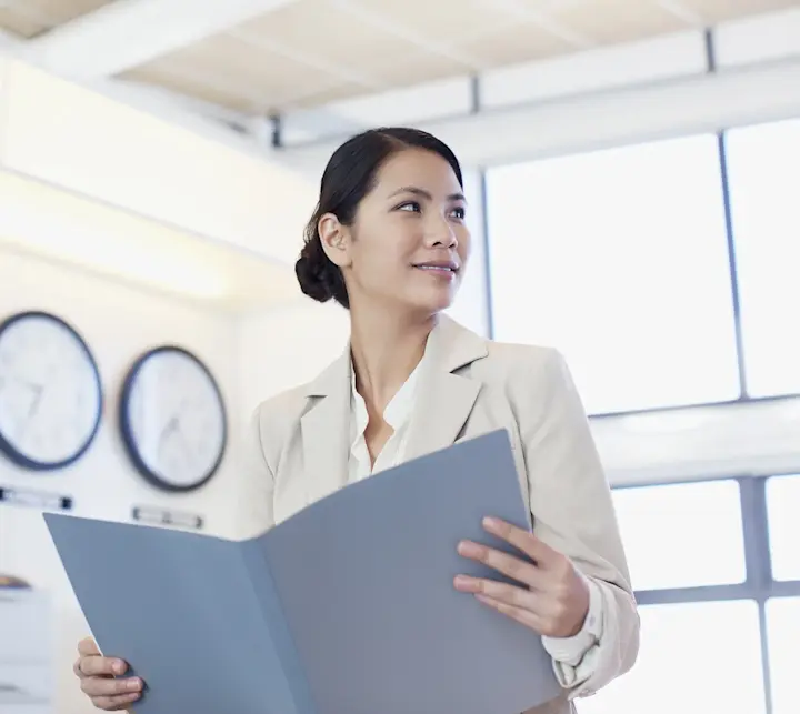 Woman reviewing global stock movements
