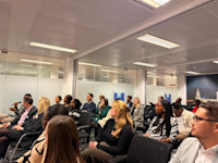 Thumbnail of The audience listens on to Computershare’s key speakers