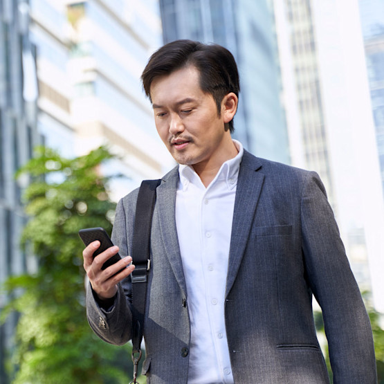 iStock-1332429837-Hero-Image-Man-Using-Phone-square