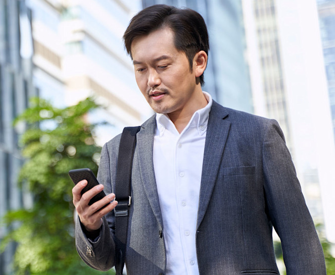 iStock-1332429837-Hero-Image-Man-Using-Phone-square