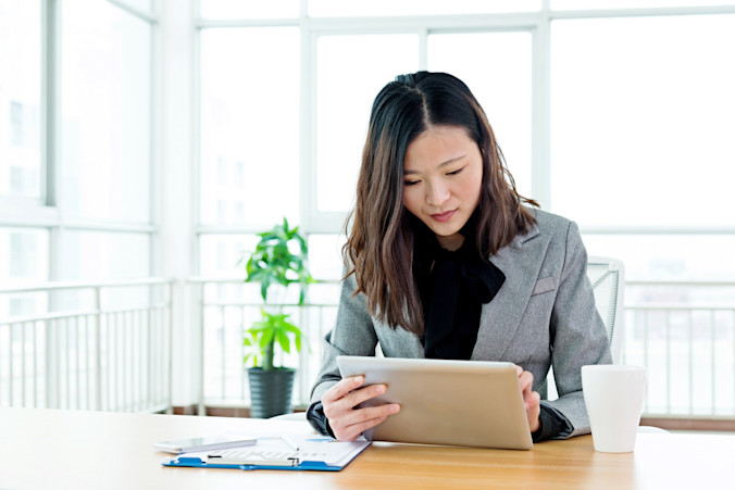 Business-woman-reviewing-documents