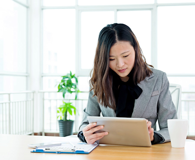 Business-woman-reviewing-documents