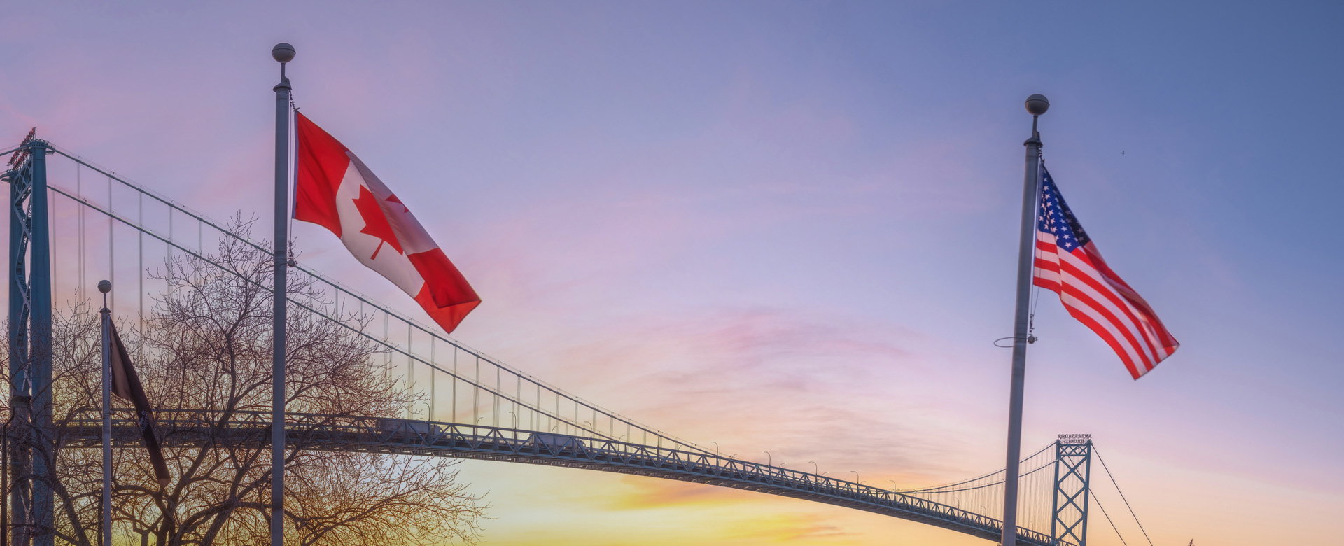iStock-1306944656-Canada-and-USA-windsor-michigan-ambassador-bridge
