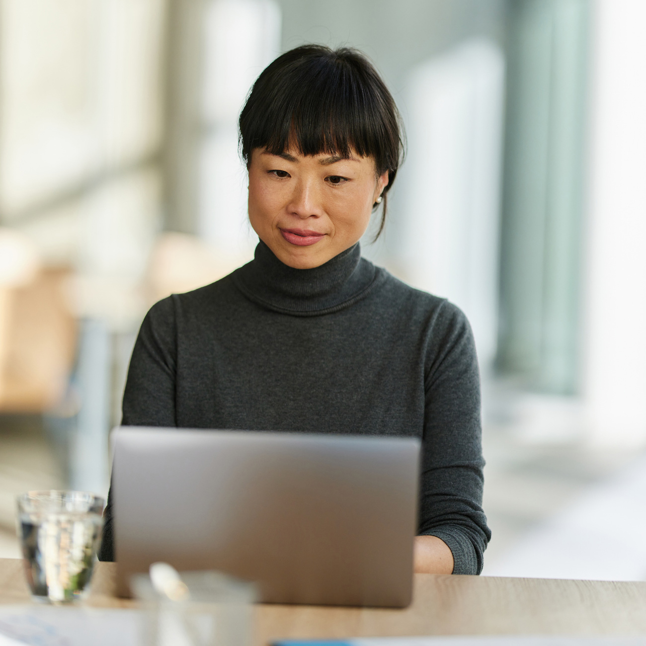 Business woman using laptop