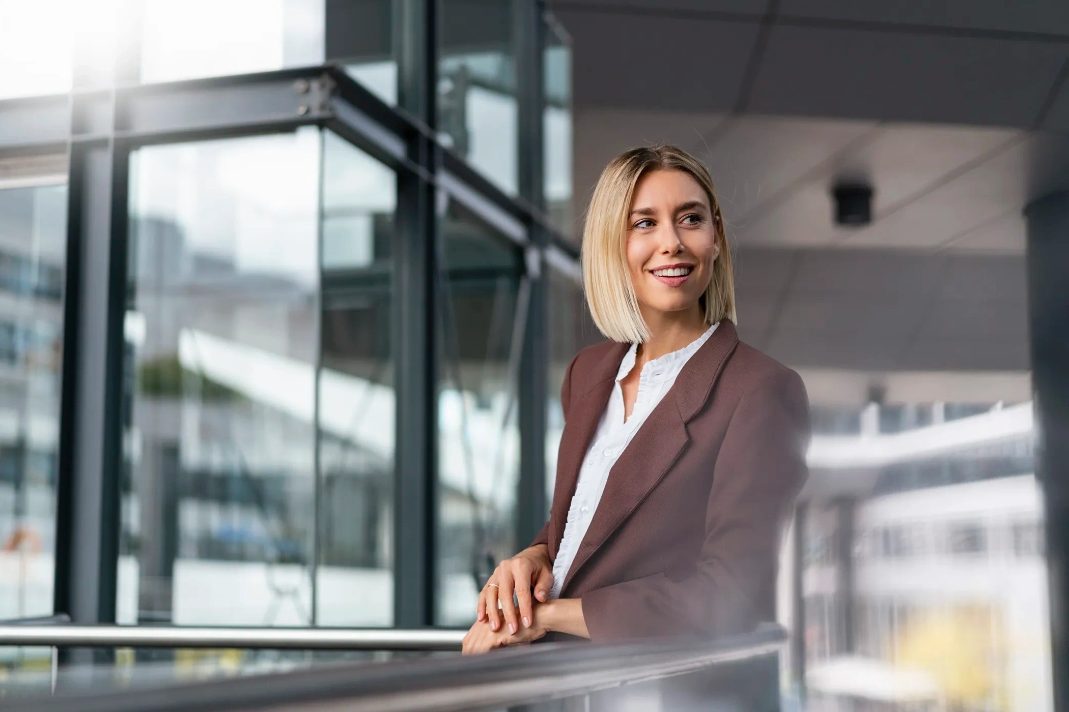 Blonde business woman looking to the left