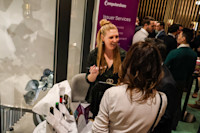 Thumbnail of An attendee partakes in a blind wine tasting
