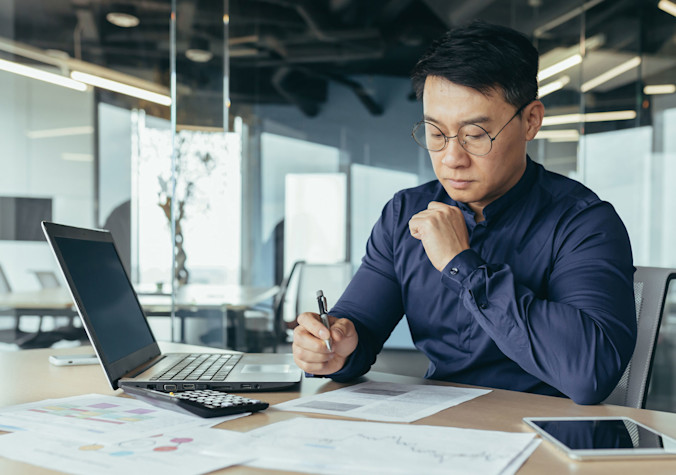 GettyImages-1434629867-Looking-over-financial-statements