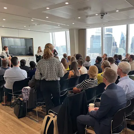 The audience listen to the key speakers Tile image of The audience listen to the key speakers