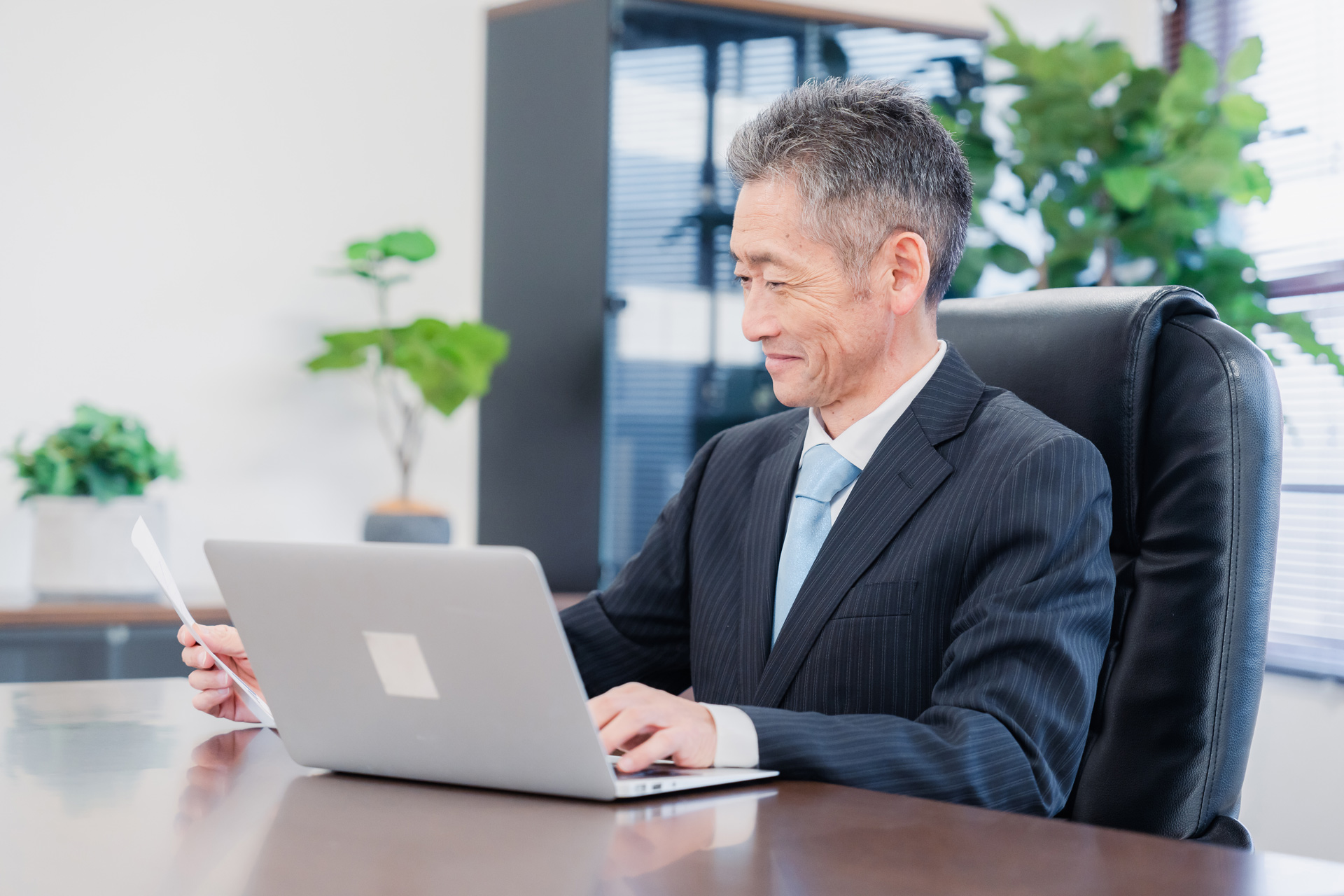 GettyImages-1452644269-president-working-with-his-computer