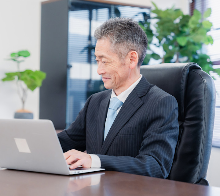 GettyImages-1452644269-president-working-with-his-computer