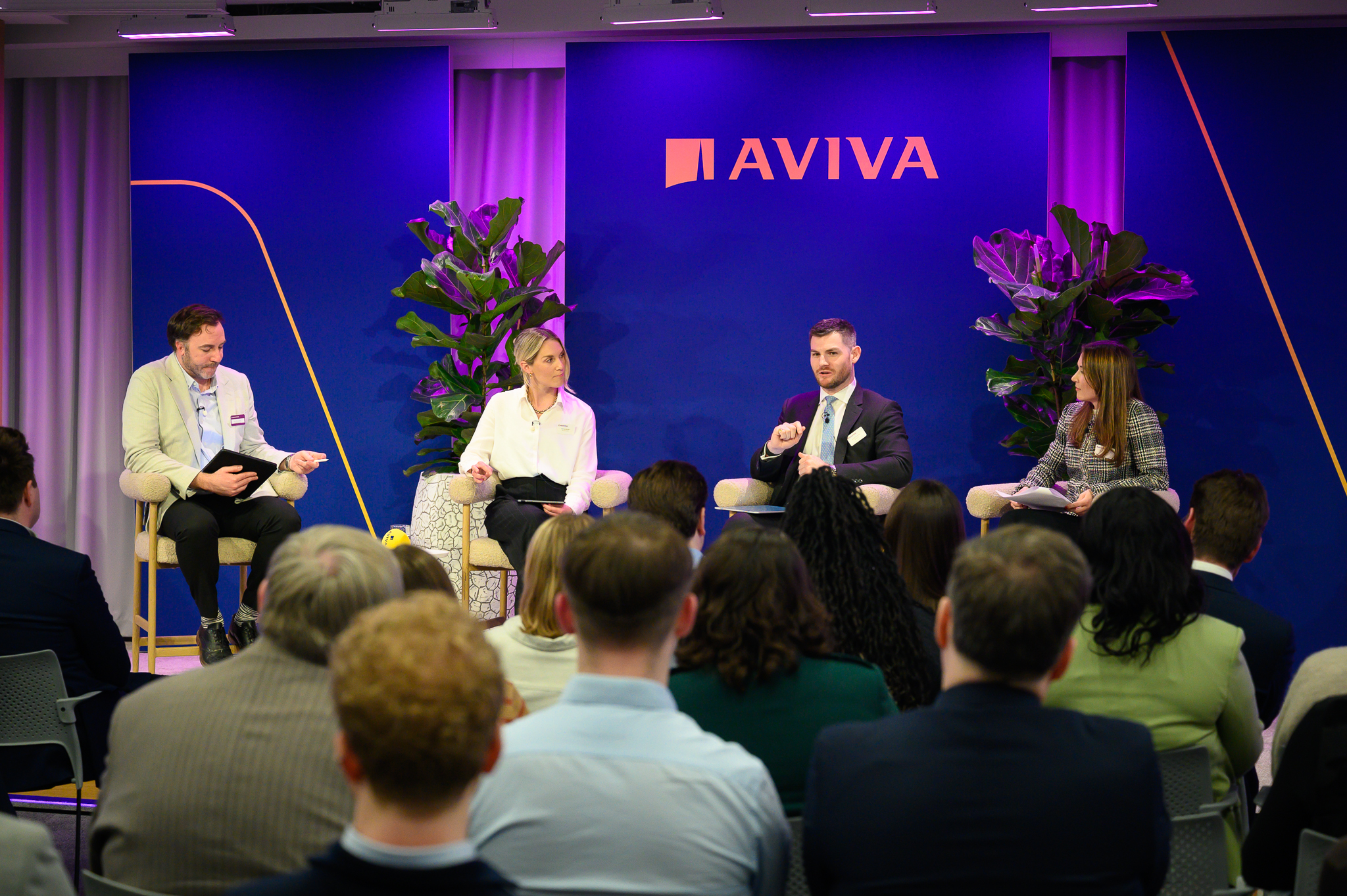 Image of The attendees watch the OpenSpace speakers discuss key topics