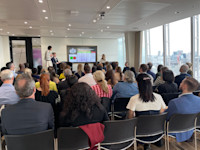 The audience listens on to Computershare’s key speakers Thumbnail of The audience listens on to Computershare’s key speakers