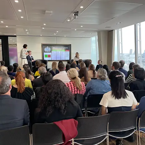 The audience listens on to Computershare’s key speakers Tile image of The audience listens on to Computershare’s key speakers