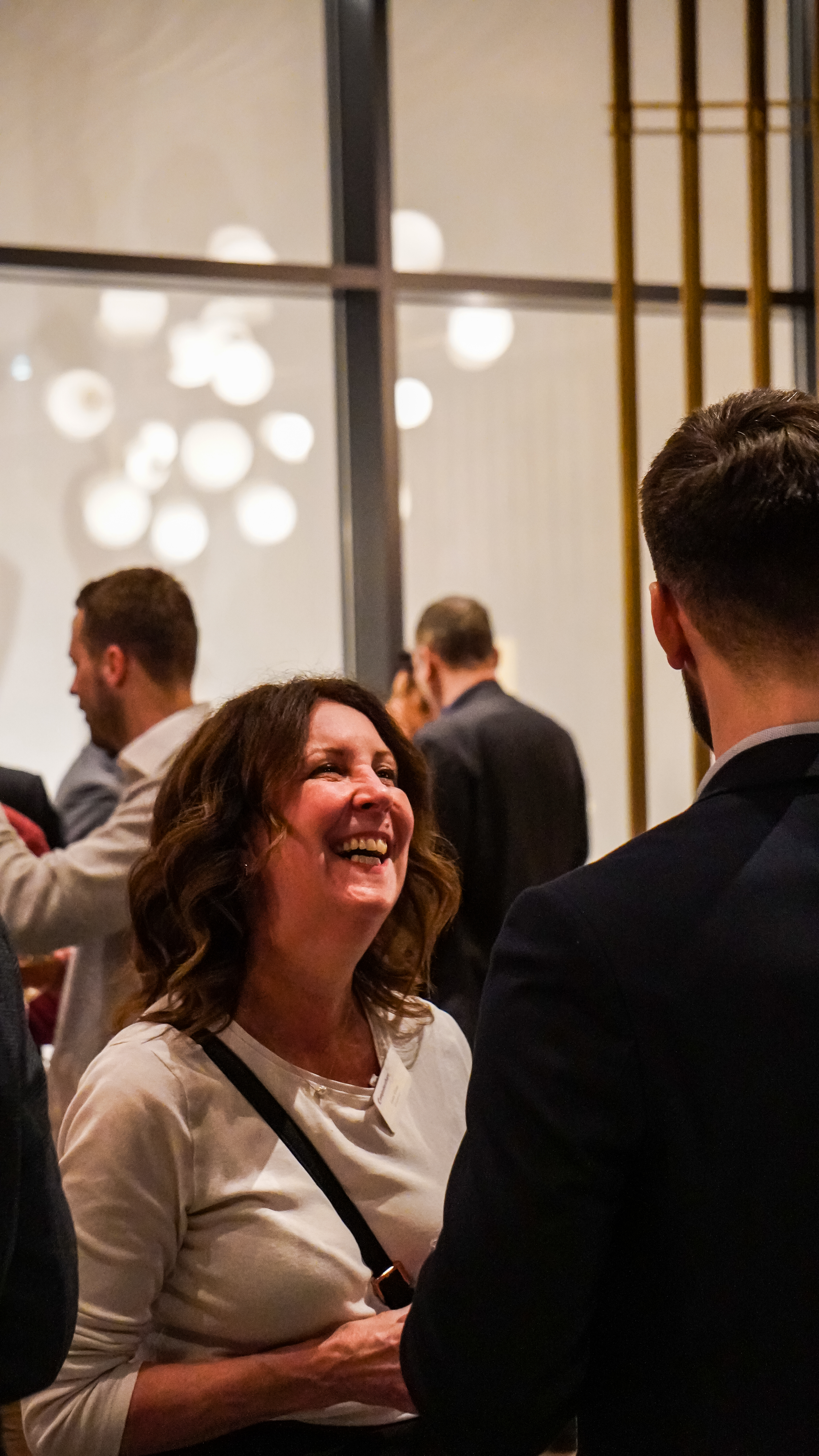 Image of An attendee enjoying the networking at the celebration of Australia Day