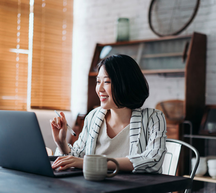 Business woman working on her laptop