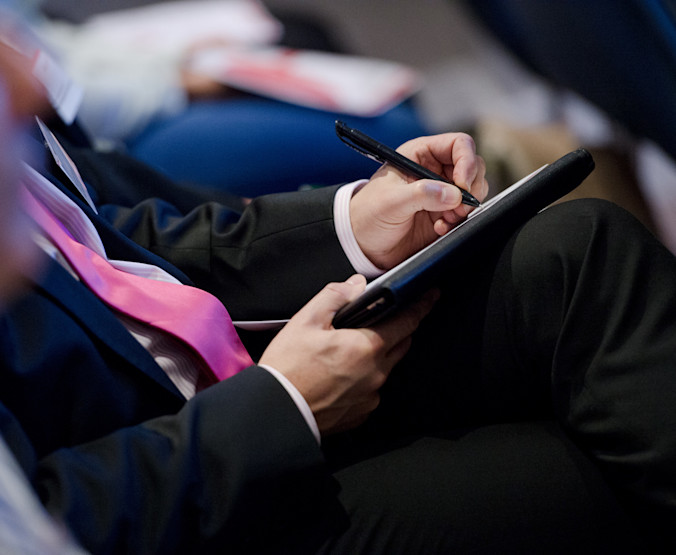 iStock-469088388 closeup male conference agm writing