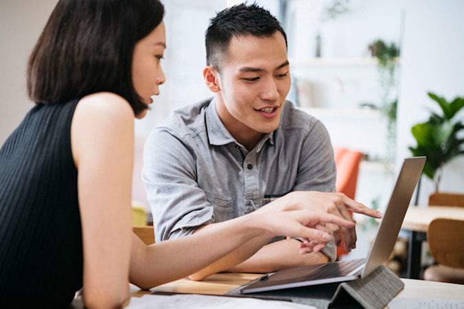 GettyImages-1154411502-Viewing-document-on-laptop