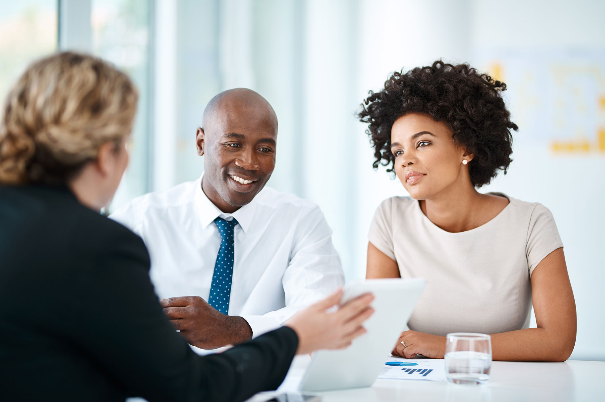 Three business professionals having a meeting