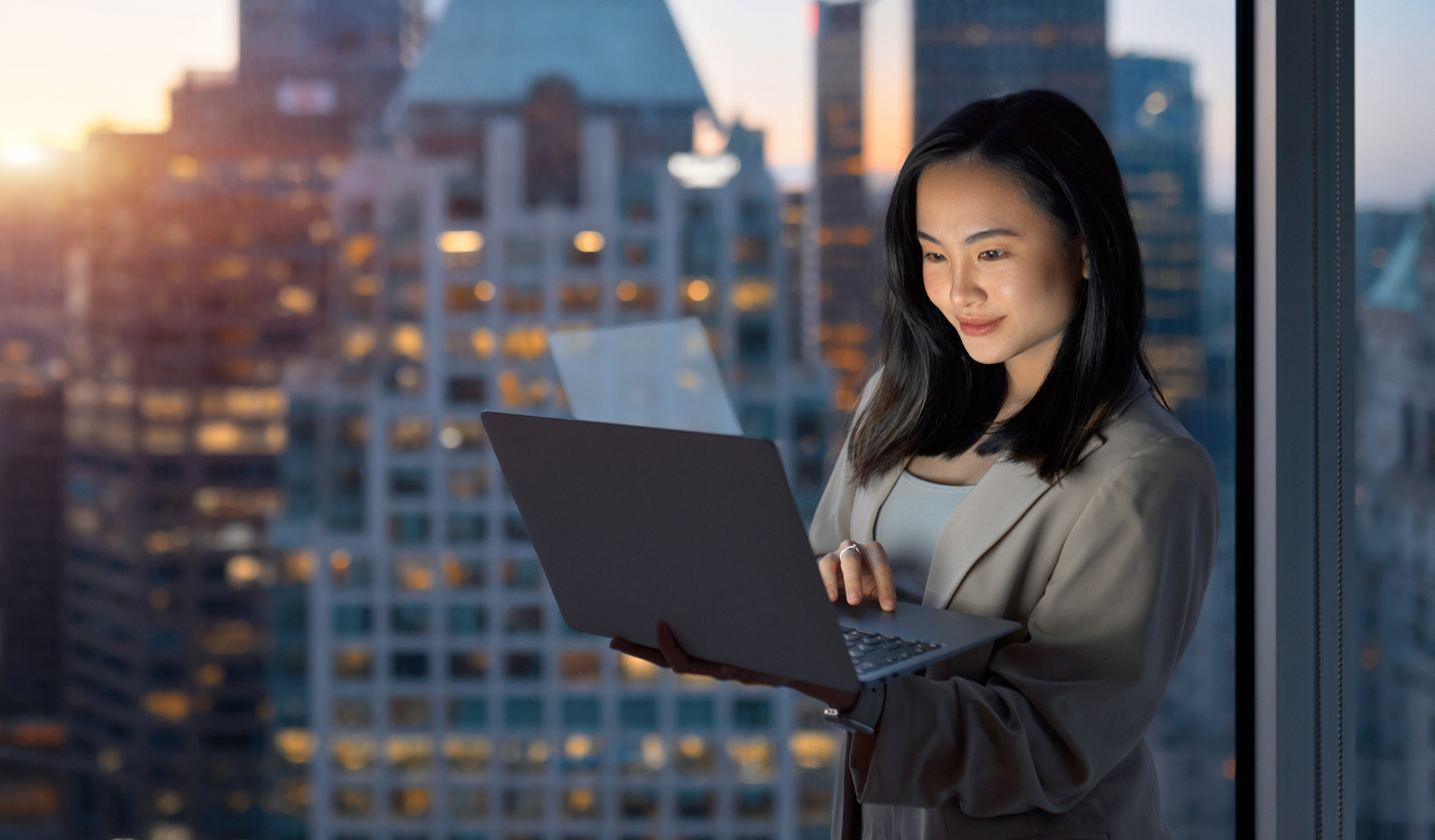 shutterstock_2347187211 viewing laptop in hotel