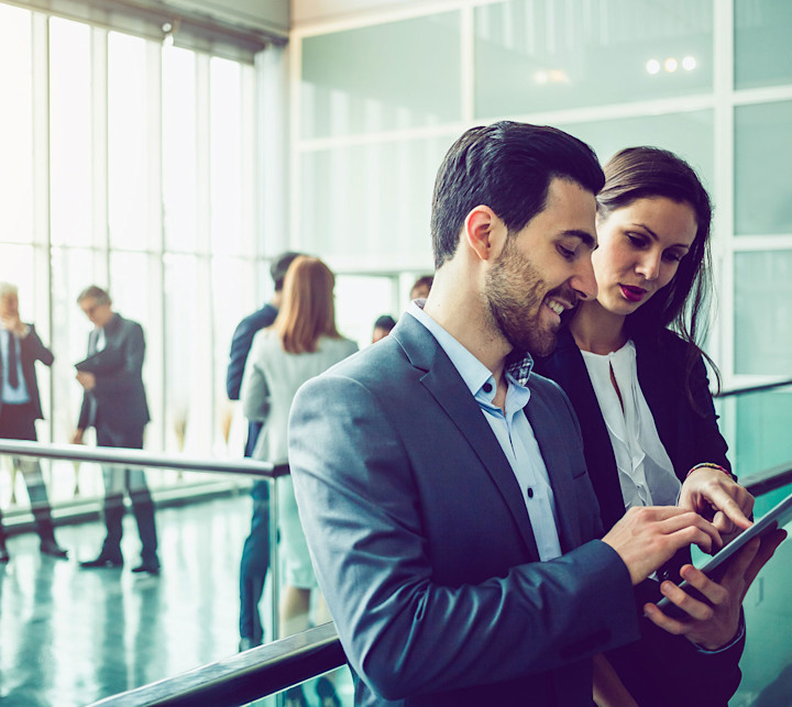 iStock-507216112-Employee-looking-at-tablet