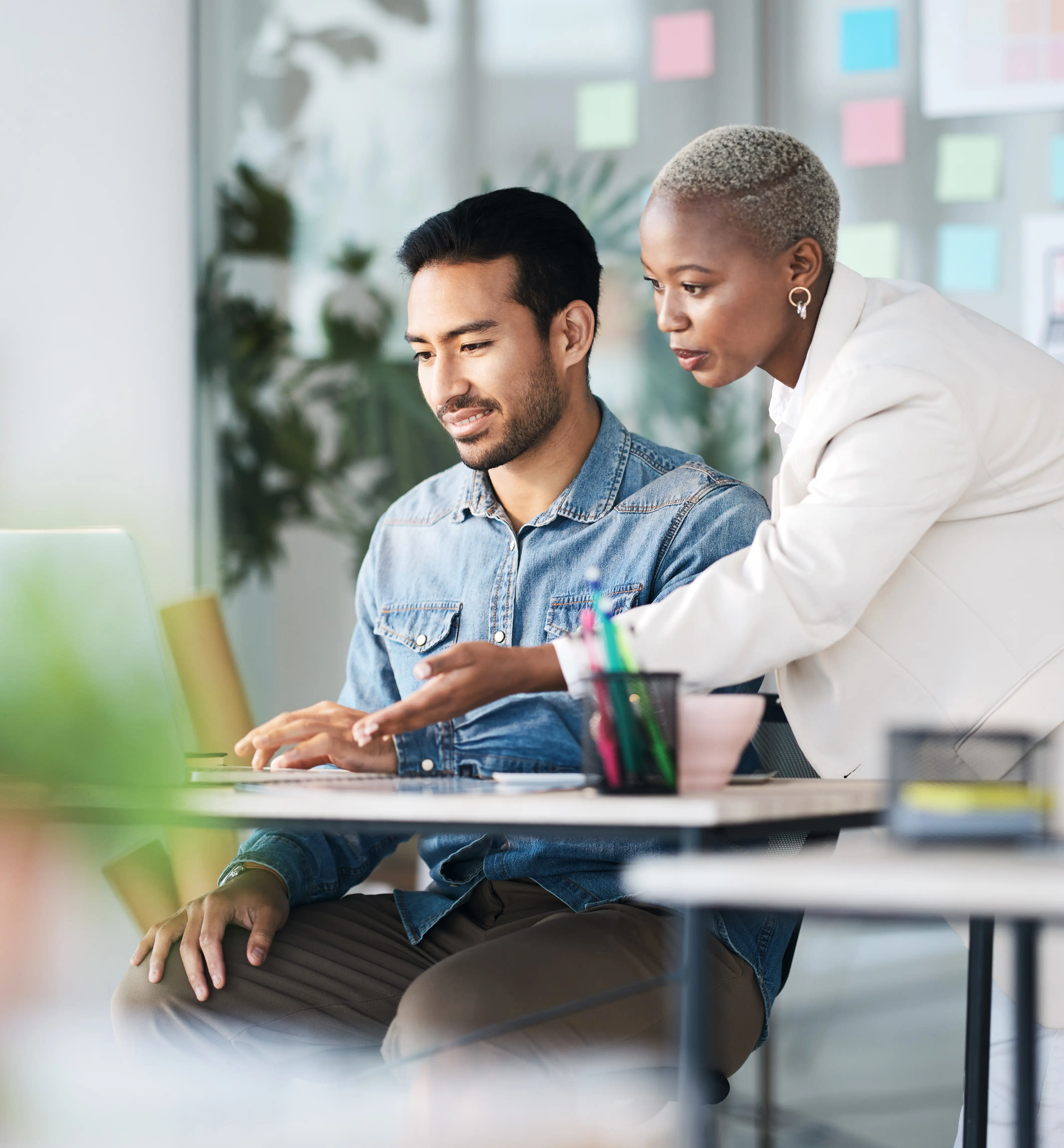 GettyImages-1553415091-Two-business-workers-updating-security
