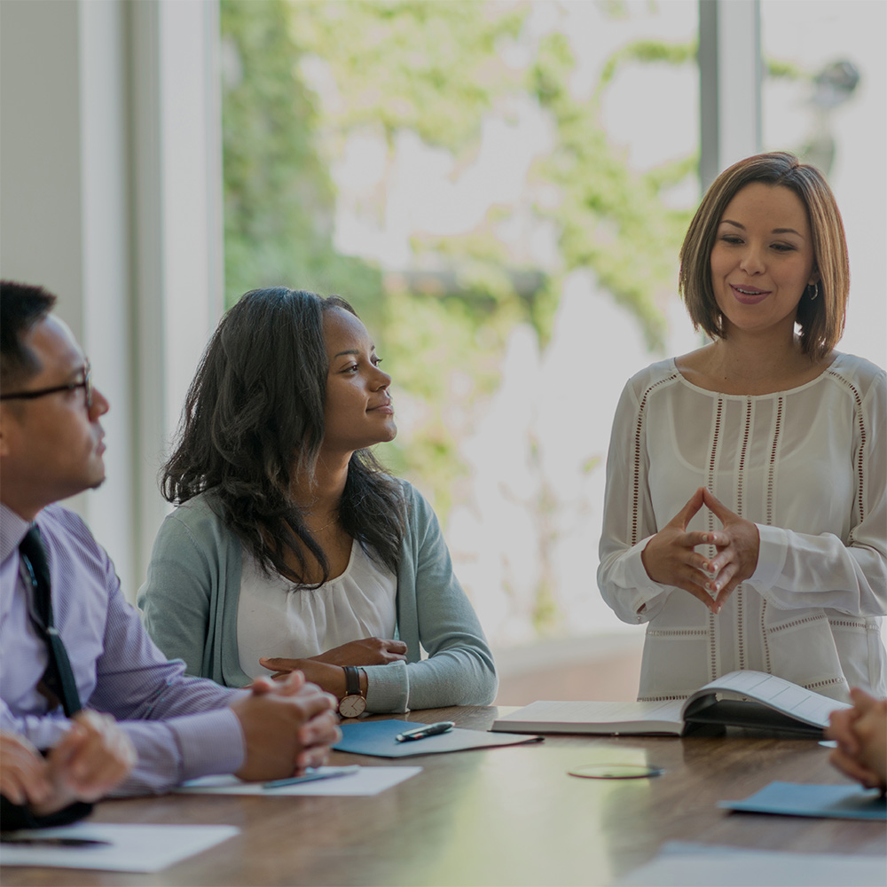 Group discussing cross-border listings