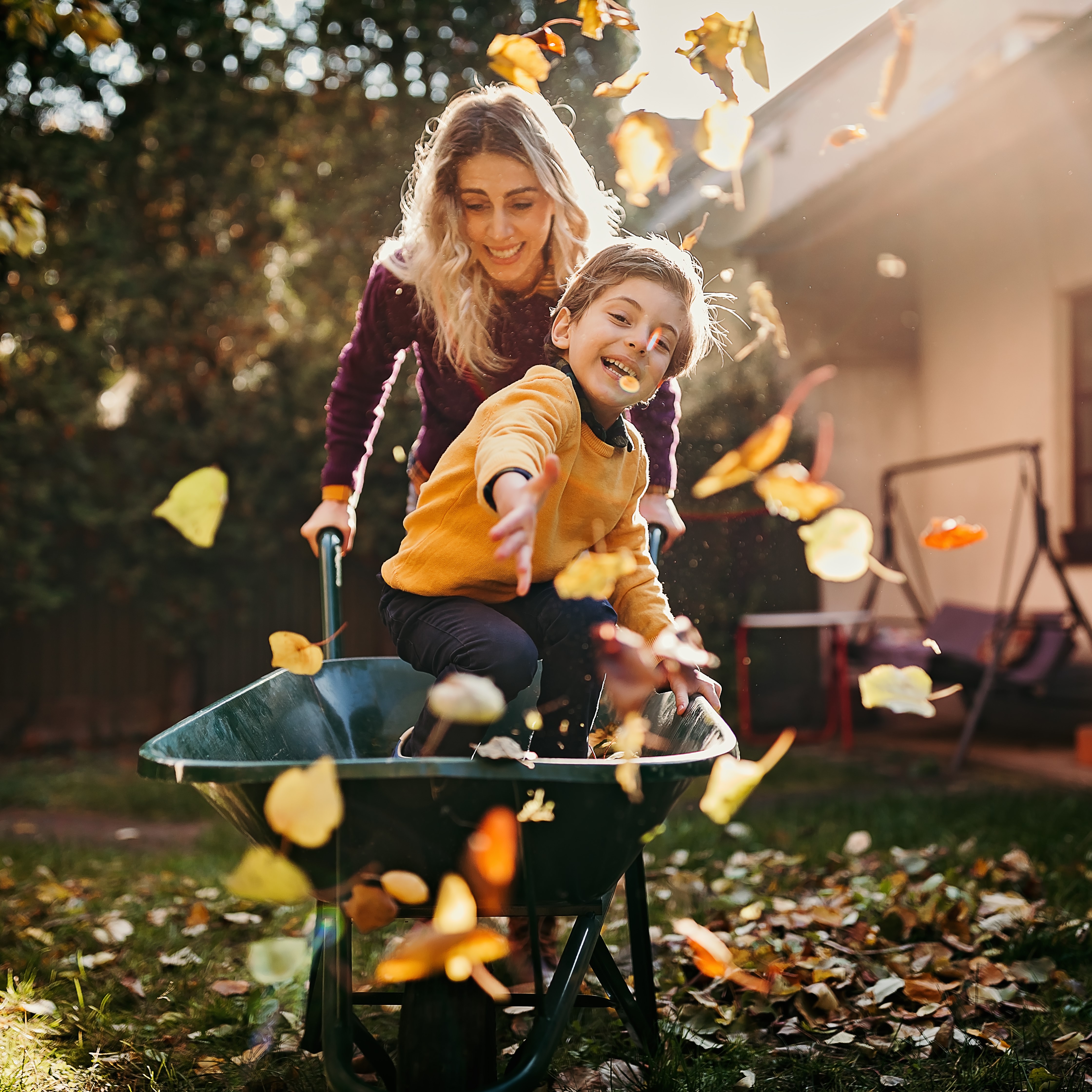 Mom and son playing in the garden