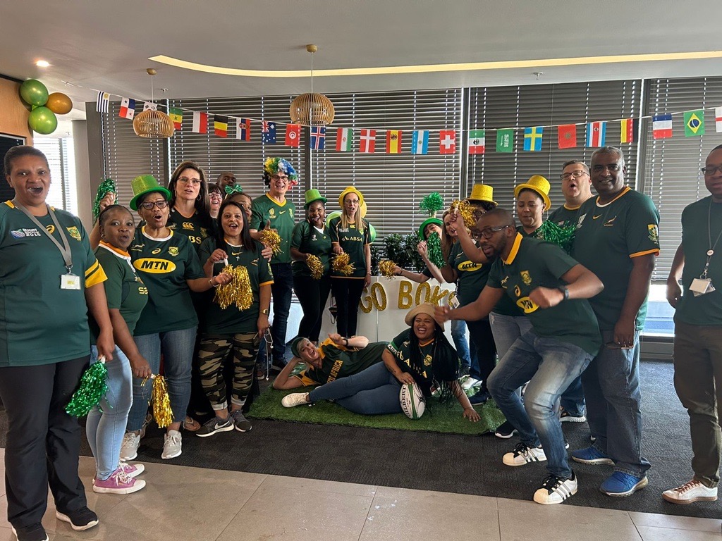 Employees celebrating the Rugby World Cup