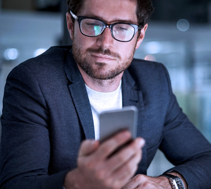 istock-637232624-using-a-mobile-device-business-man