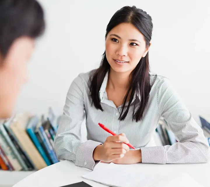 Business people talking at desk