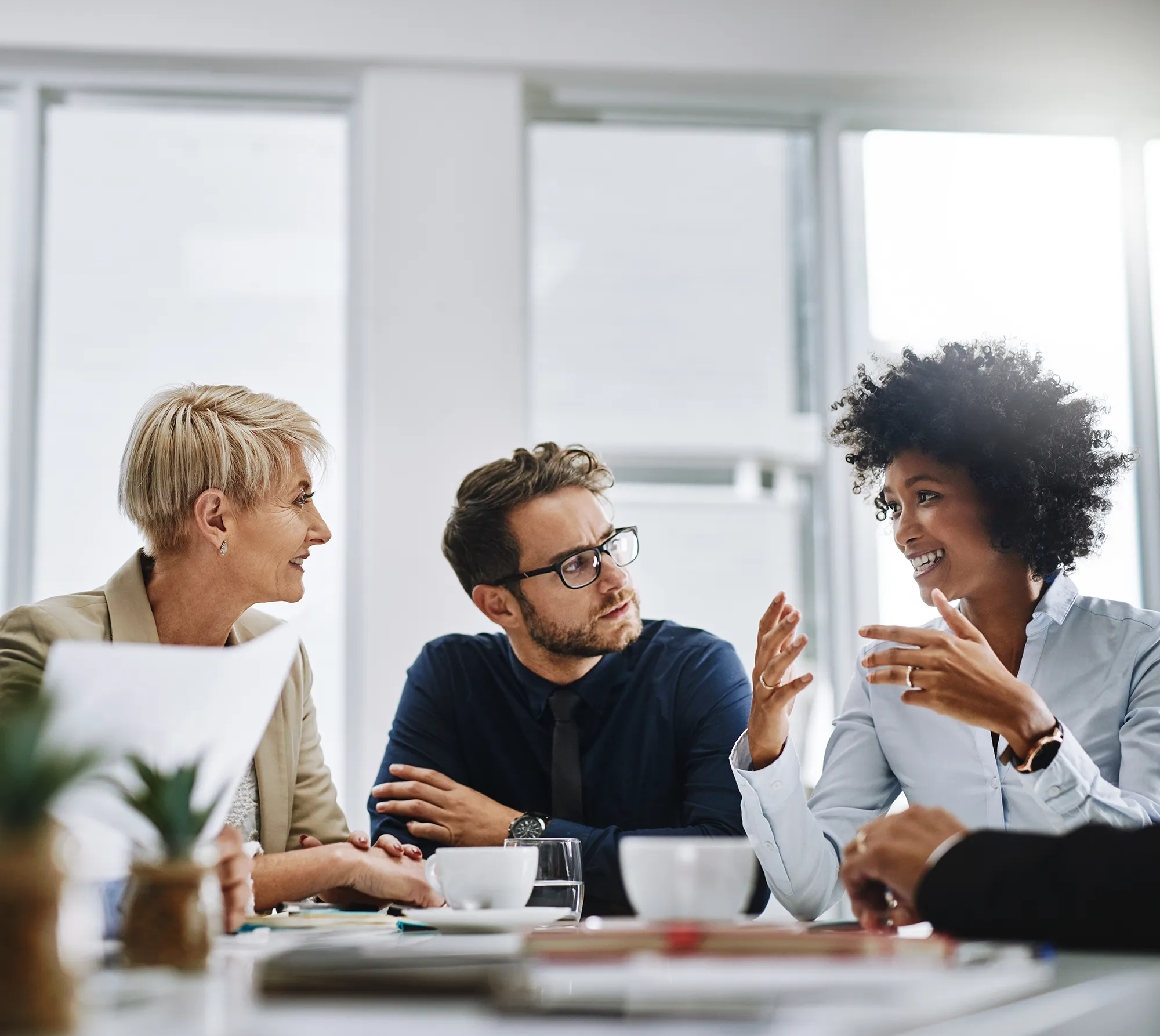 Three colleagues at a table