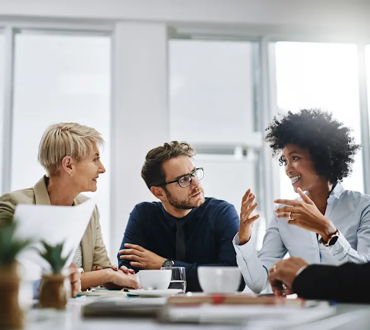Three colleagues at a table