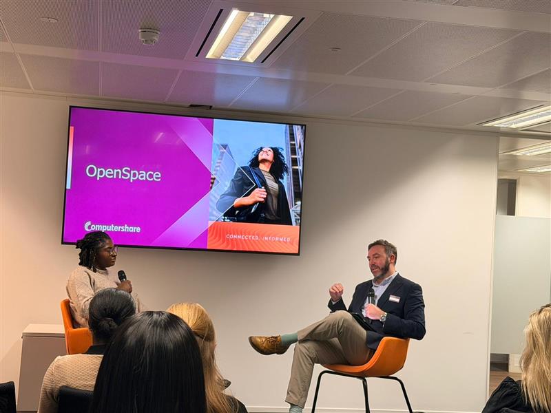 Image of The speakers share thoughts on stage