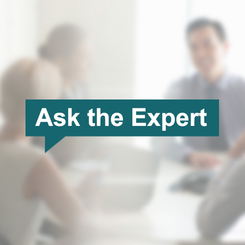 Three business professionals meeting.