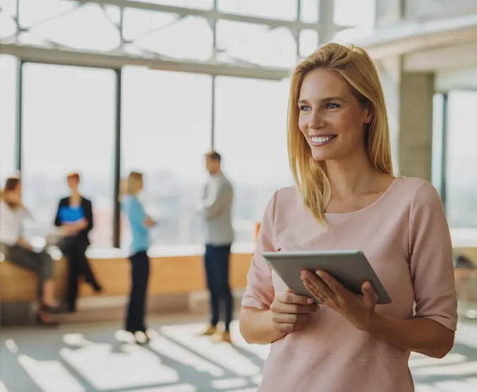 woman pink shirt tablet