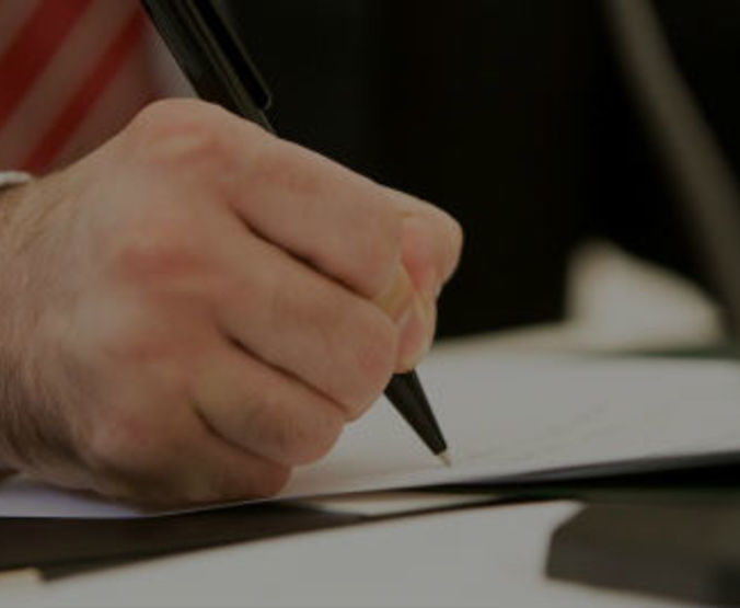 close up writing hand