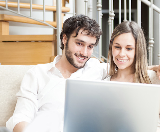 couple using a notebook