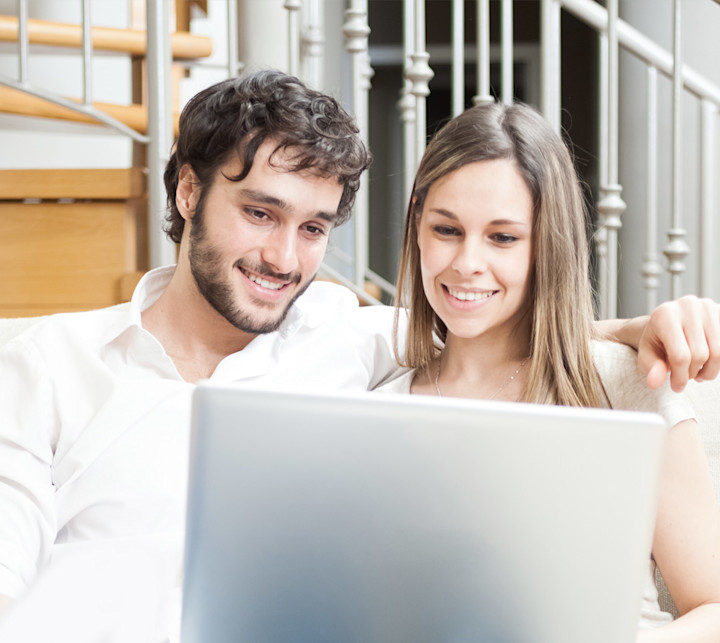 couple using a notebook