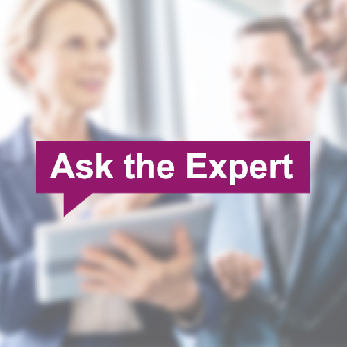 Three business professionals meeting.